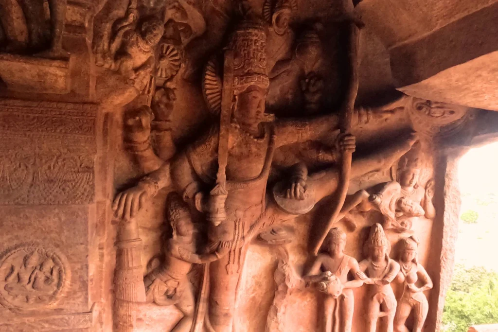 Vishnu in Trivikrama form carved into rock face at Badami Cave Temple number 3 Karnataka