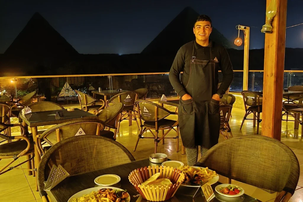 A Night View of the Giza Pyramids with dinner served at the hotel rooftop