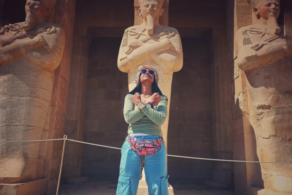 Sumana posing like the statues at the Hatshepsut Mortuary Temple