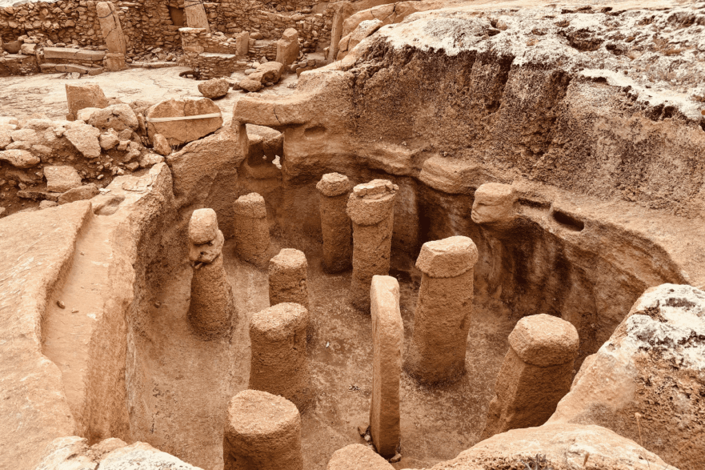 THE RAW, OPEN-AIR EXCAVATION TRENCHES REVEALS HUNDREDS OF STANDING STONES AT KARAHAN TEPE