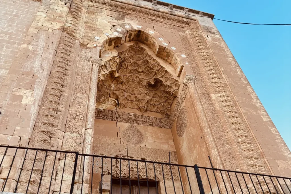  A close-up of a carved stone archway at the Zinciriye Madrasa.