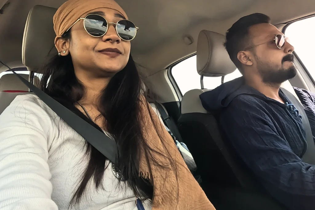 Akash & Sumana inside their vehicle.
