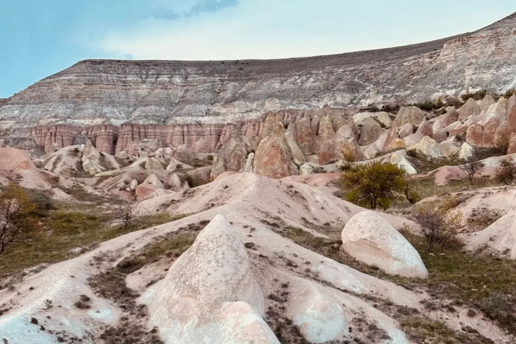 Rose Valley Striated cliff faces and unique geological ridge formations showcasing warm pink hues in Rose Valley.