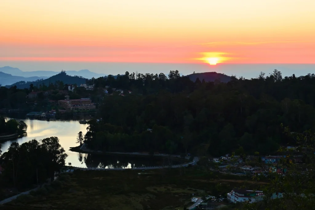 KODAIKANAL Kodaikanal Lake reflecting the evening sky and surrounding hills.
