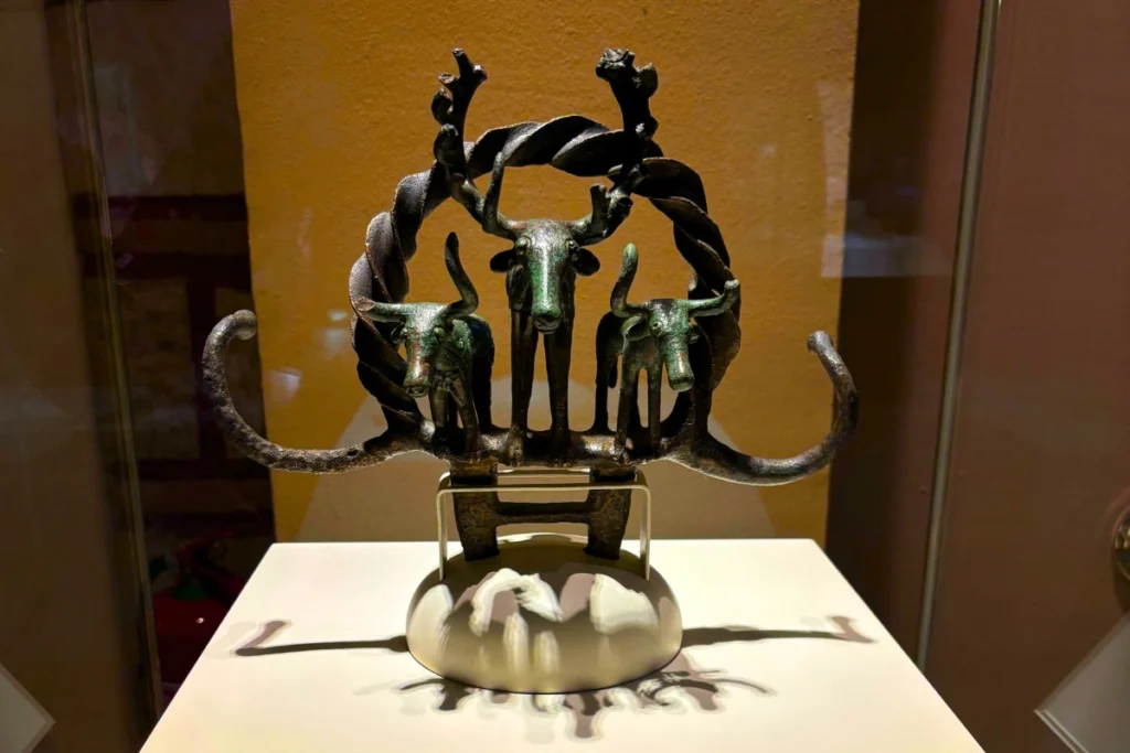 Alacahoyuk 2 Detailed close-up of a bronze ceremonial standard featuring stylized bull horns and deer figures from Alacahöyük.