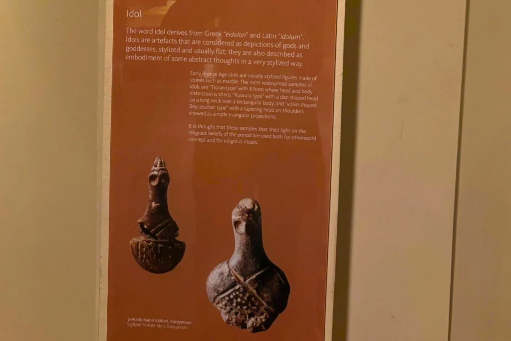 Idol 1 Informational museum panel explaining the history and cultural significance of ancient Anatolian idols and figurines.